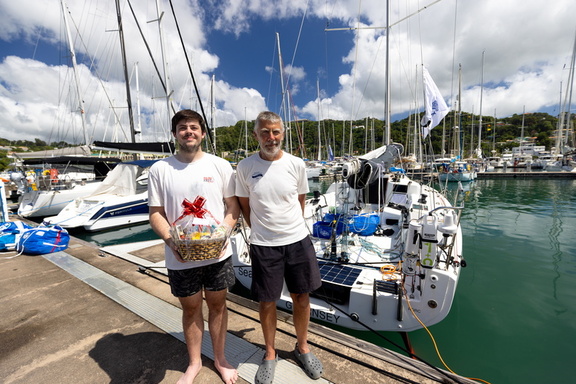 Refreshed after a night's sleep, Sea Bear's co-skippers Peter and Duncan Bacon receive their welcome basket