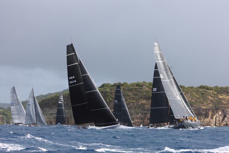 The fleet proceeds up the Antigua coastline