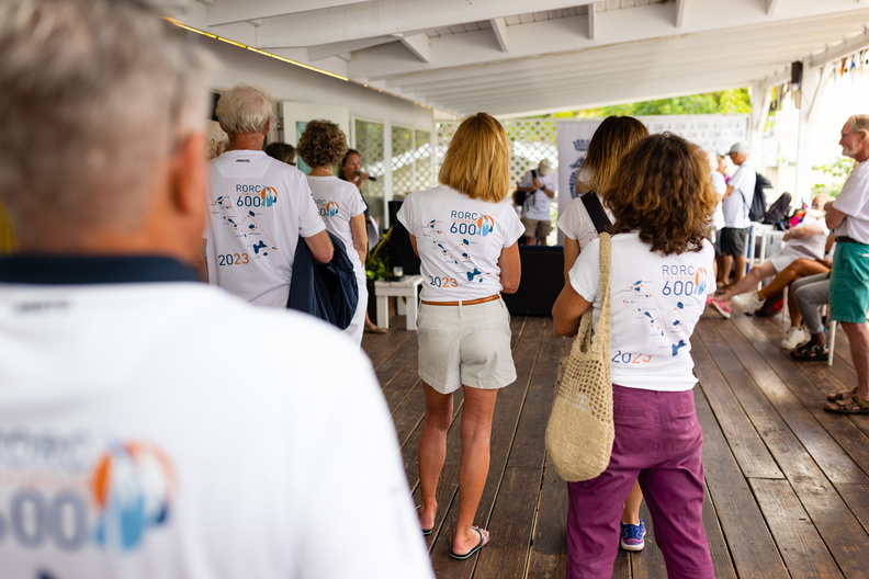 The volunteers at the Antigua Yacht Club listen the Jeremy Wilton and Helen Spooner