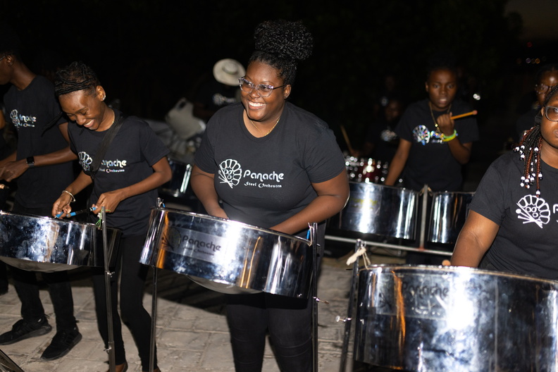 Traditional steel bands set the tone
