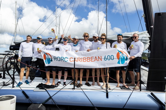 Gunboat 68 Tosca celebrate with the race banner