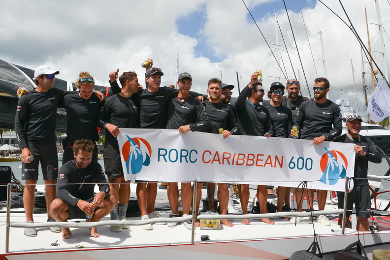 I Love Poland crew pose with the race banner, third in IRC Super Zero