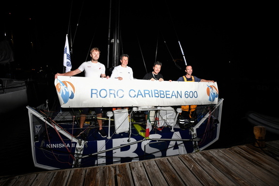 IBSA's crew pose with the race banner