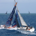 Everial, Class40 sailed by Stan Thuret crosses in front of Kali, Erich Buri's First 47