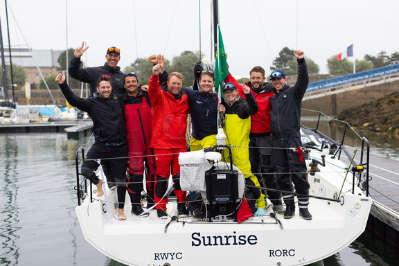 Sunrise III celebrate on the dock in Cherbourg-en-Cotentin at the end of the race