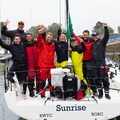 Sunrise III celebrate on the dock in Cherbourg-en-Cotentin at the end of the race