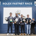 Rolex Fastnet Race 2023 Overall winner, Max Klink's Botin 52 Caro's crew collect the Fastnet Challenge Cup