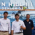 Francois Charles (left) and crew of Sun Hill III pick up the Bloodhound Cup for best corporate yacht