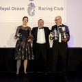 Deb Fish and Rob Craigie of Bellino, with Commodore James Neville