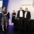 Deb Fish welcomes Eric de Turckheim of Teasing Machine to the stage to collect the Somerset Trophy for Yacht of the Year