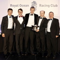 Ed Bell and the crew of Dawn Treader collect the Trenchemer Cup for first in IRC One