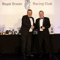 Commodore James Neville collects Ino Noir's medallion for 3rd in IRC Zero from RORC Race Manager Steve Cole