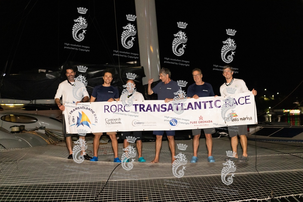 Zoulou crew pose for the race finish photo