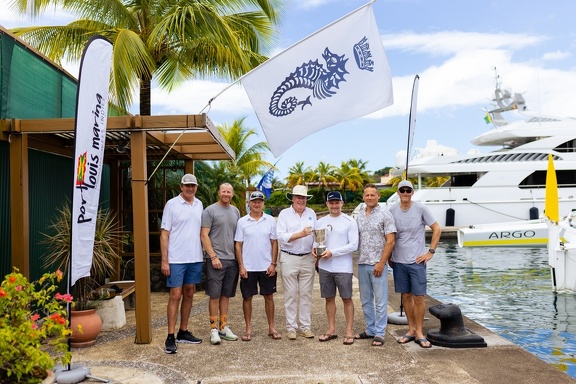 Jason Carroll and his crew on Argo celebrate winning the Multihull class as well as multihull line honours