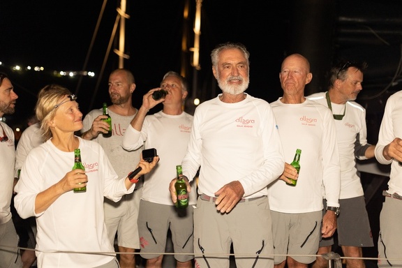 Adrian Keller and his crew celebrate finishing the race