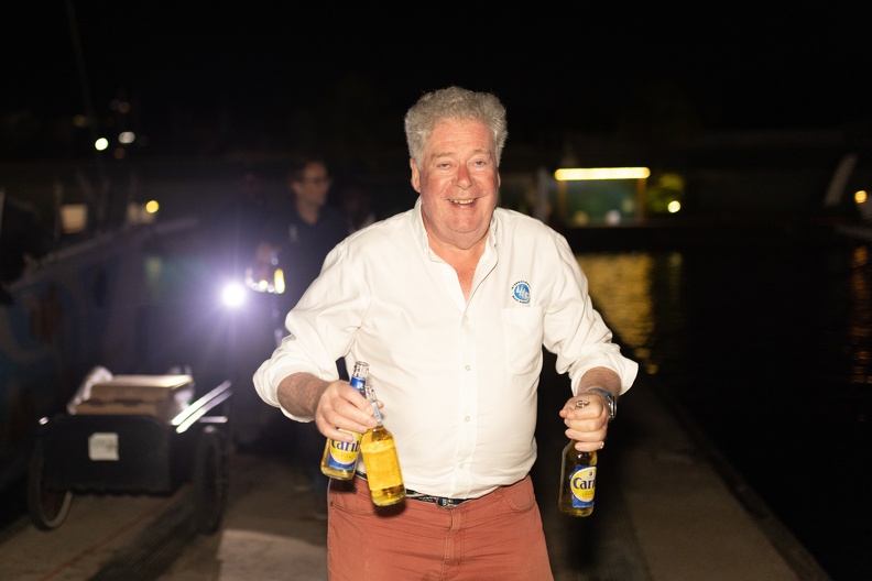 IMA Secretary General and former RORC Commodore Andrew McIrvine hands out the beers