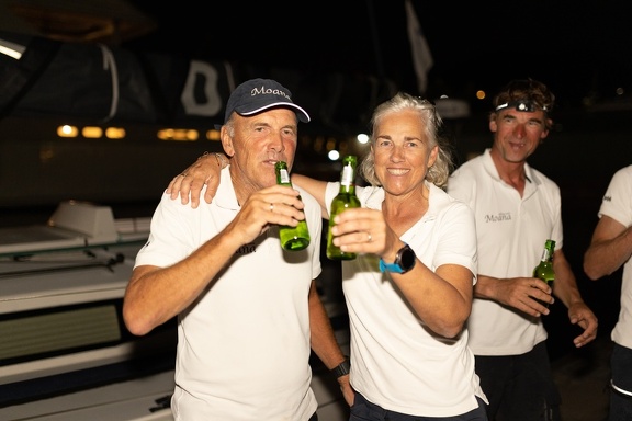 Moana crew celebrate with beer on the dock