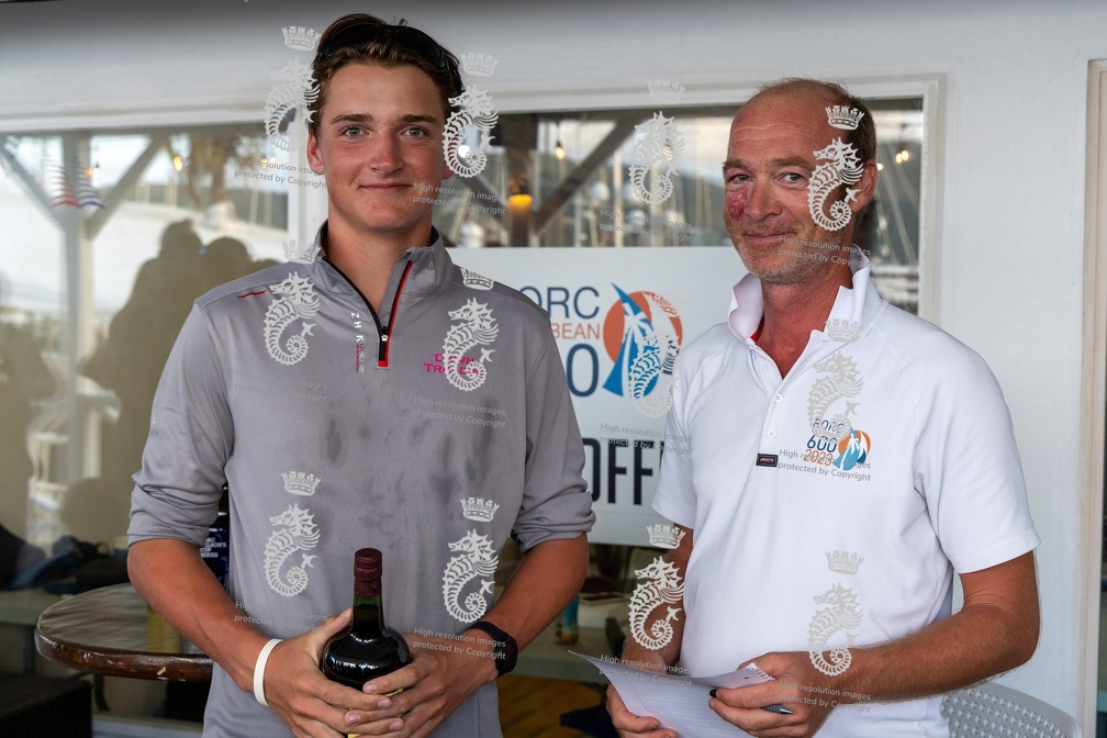 Crew of Dawn Treader, JPK 11.80 sailed by Ed Bell, collect their prize for finishing 1st and 2nd in IRC Two