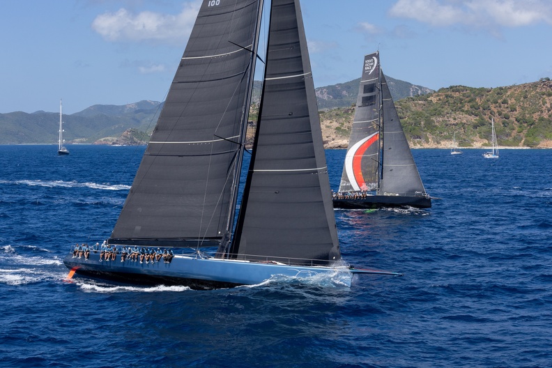 Leopard 3, 100-footer owned by Joost Schuijff, with VO65 Sisi to leeward