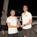 RORC CEO Jeremy Wilton presents Jason Carroll with the trophy