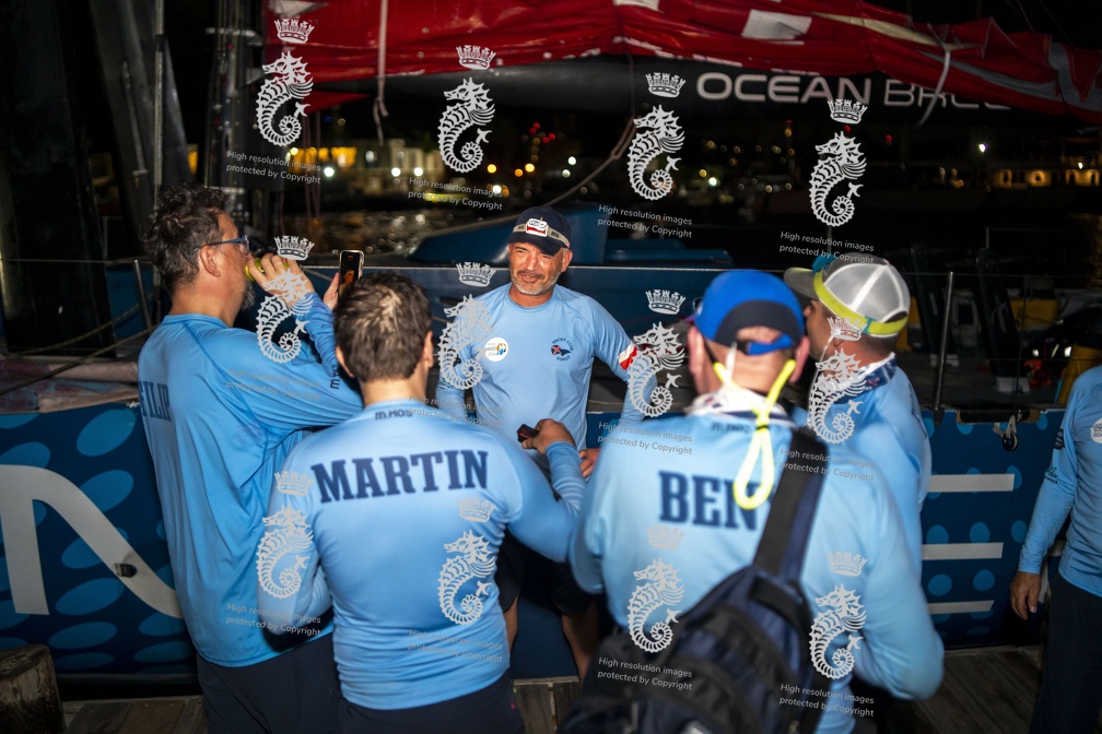 Ocean Breeze crew celebrate finishing the race