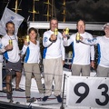 Rule One crew celebrate their race with beers