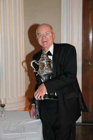Robin Taunt of Jibe with the Alan Paul Trophy and the J109 RORC Trophy